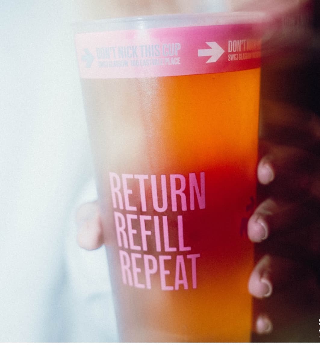 UKCA-marked reusable cups being used at a bar