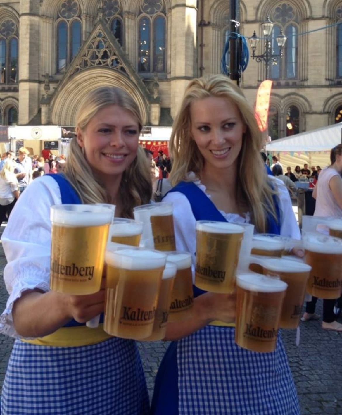 Collection of custom printed festival cups with branded designs